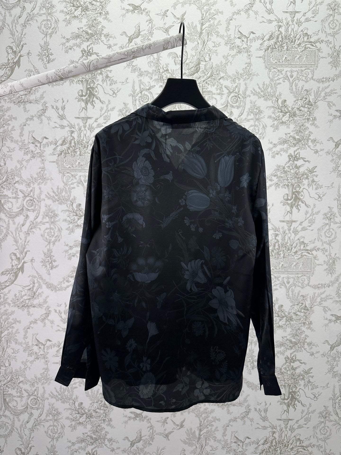 Long-sleeve button-up shirt, dark with allover light floral pattern