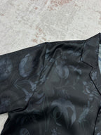 Long-sleeve button-up shirt shoulder area with allover light floral print