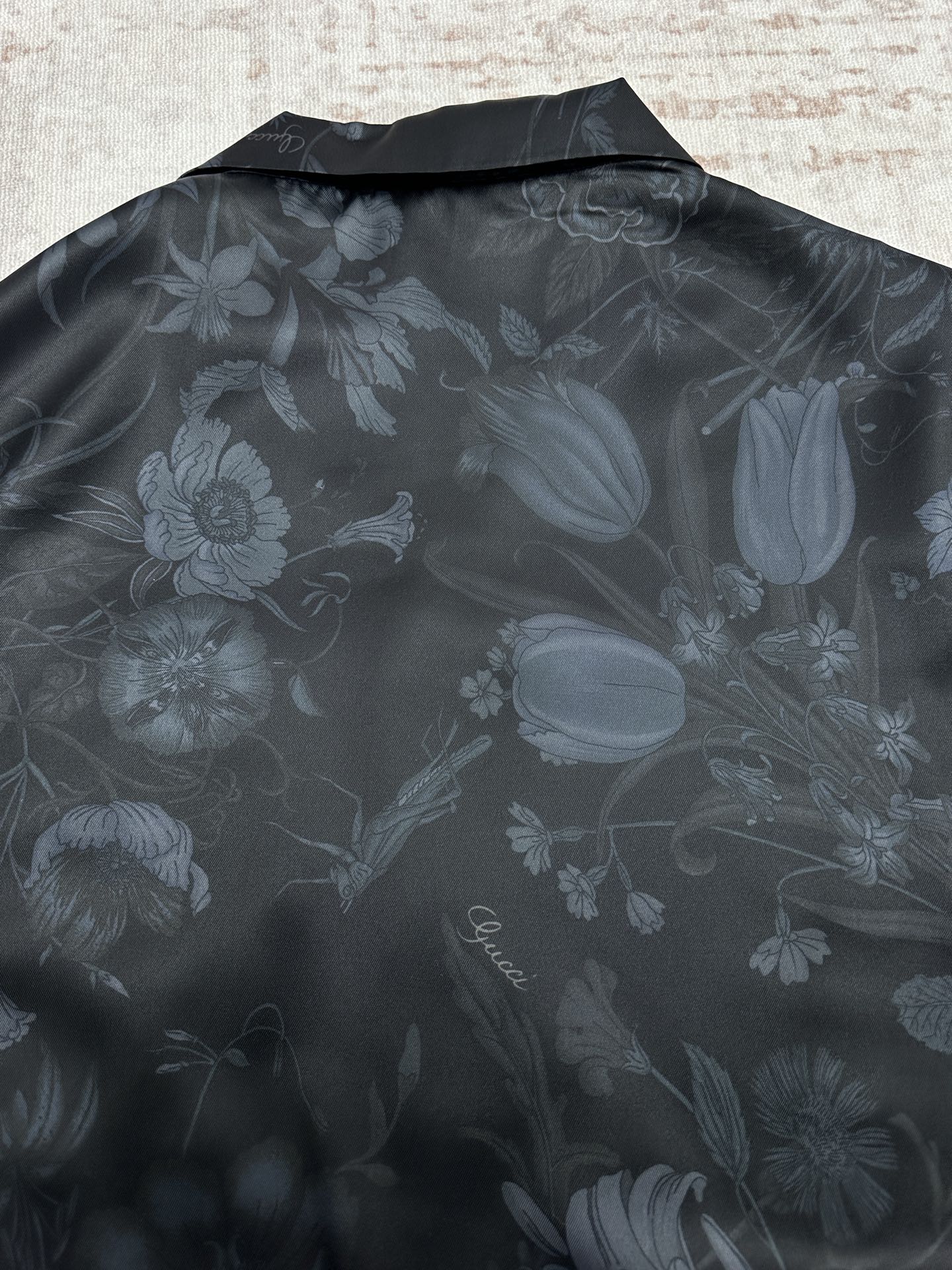 Long-sleeve button-up shirt back with allover light floral pattern