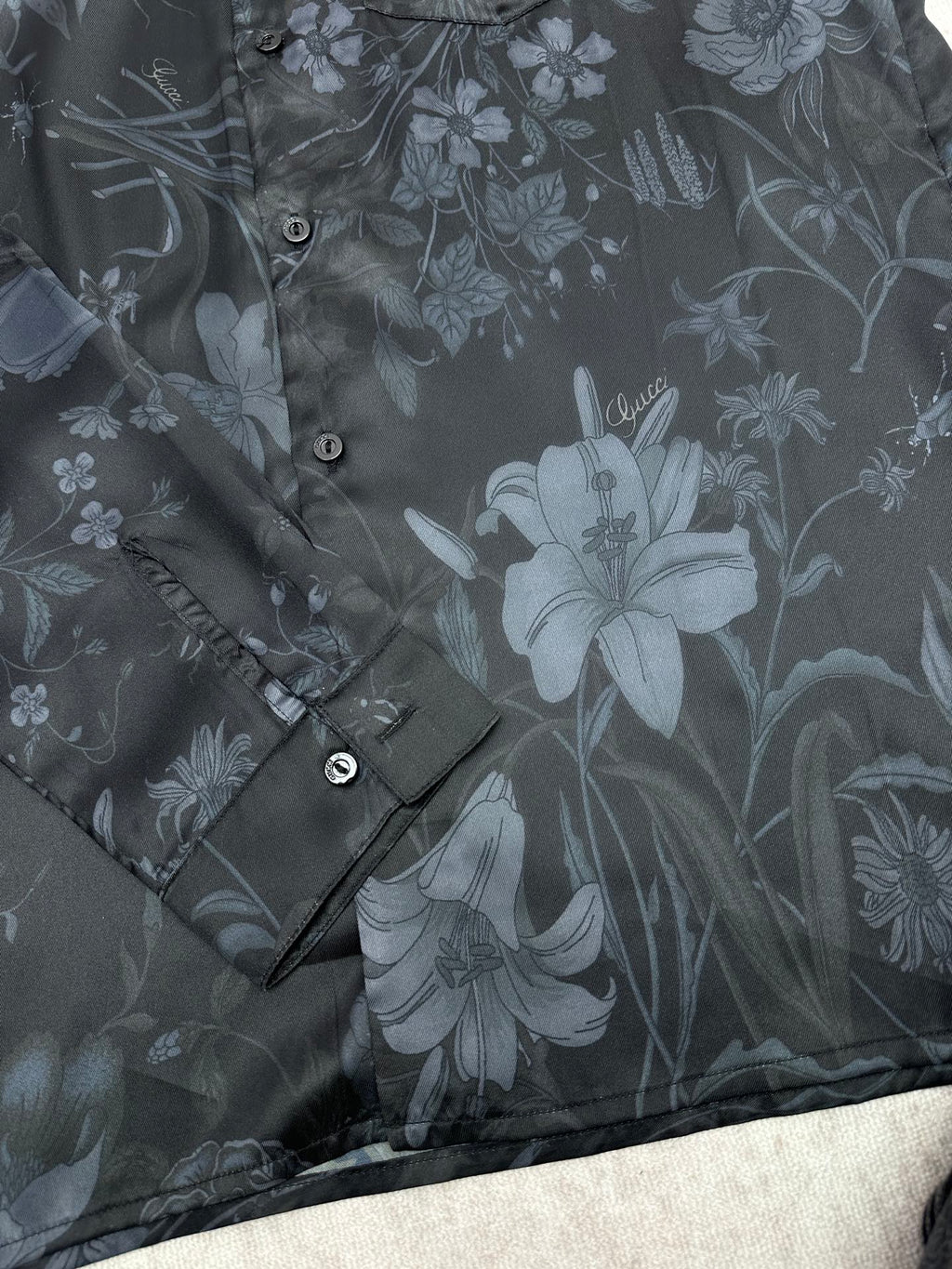 Long-sleeve button-up shirt fabric texture with floral pattern and buttons