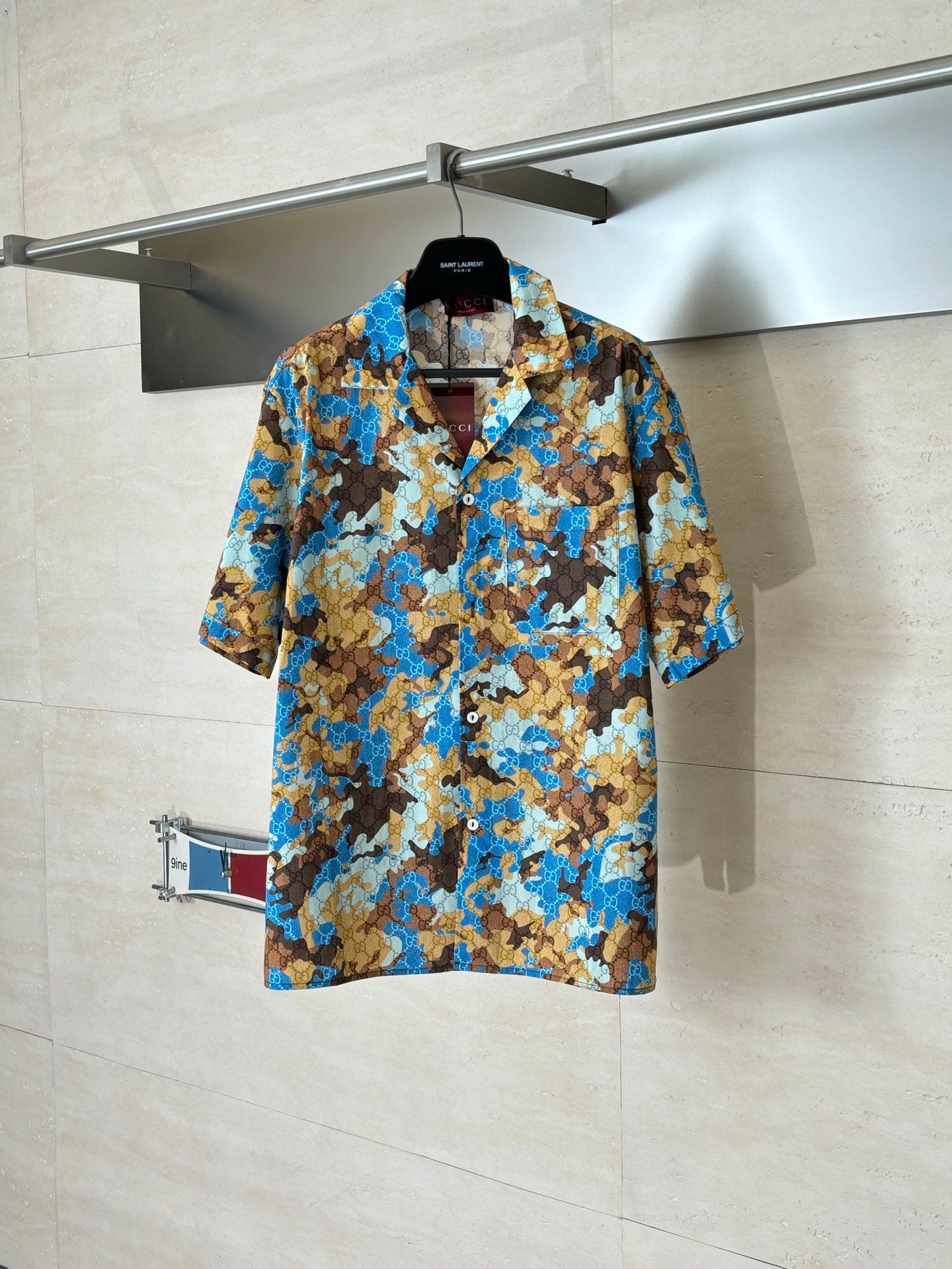 Gucci short-sleeve button-up shirt with blue and tan abstract pattern