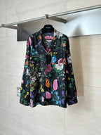 Black long-sleeve shirt with colorful floral pattern