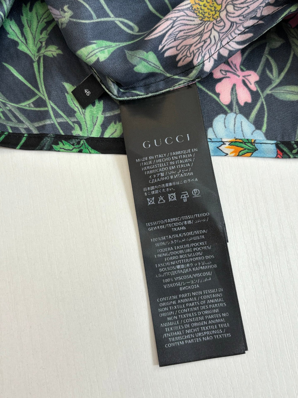 Gucci long floral shirt, dark base with pink and green flower print, with size tag