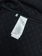 Dark navy short-sleeve shirt, neckline with size and care labels inside