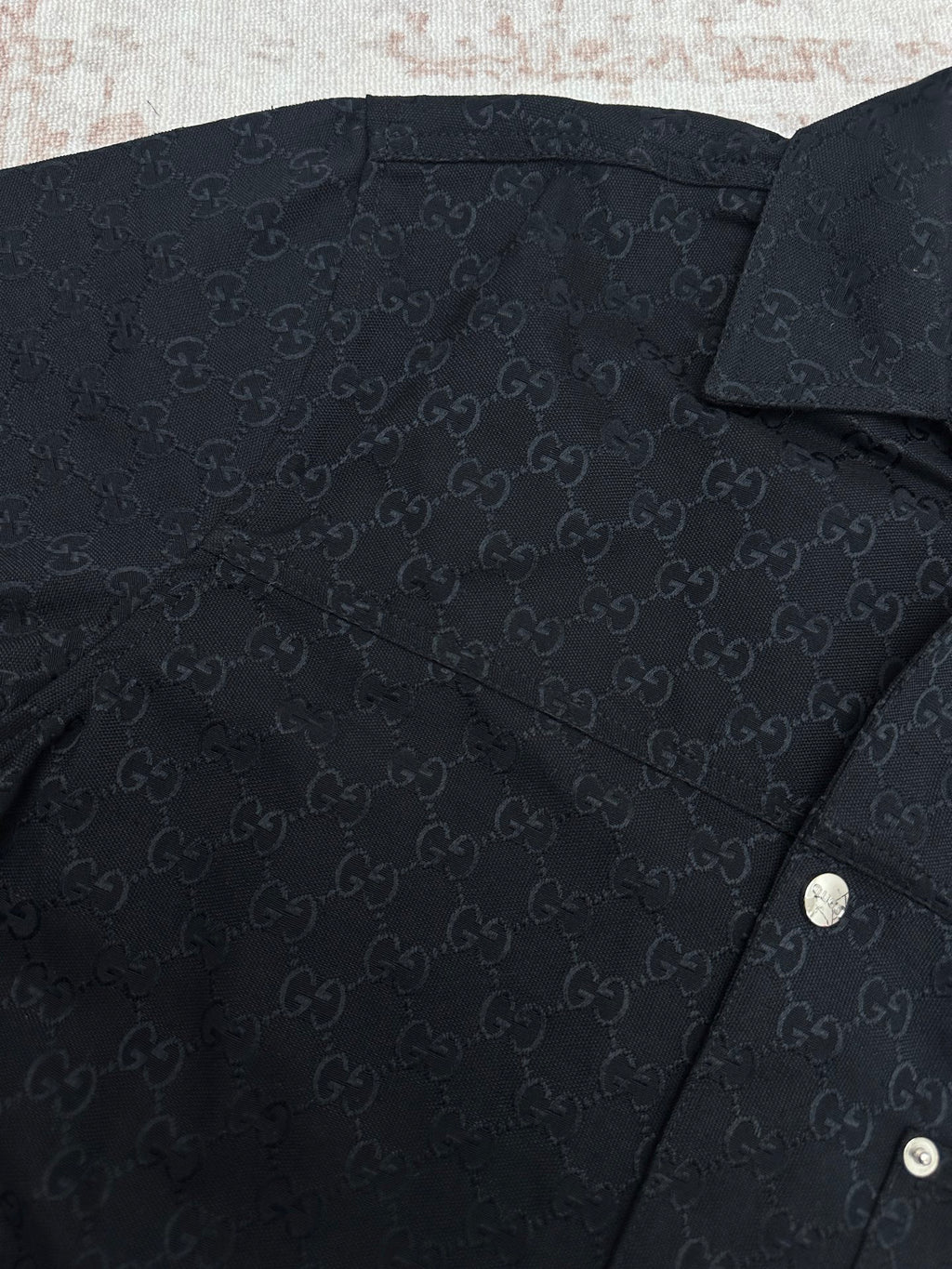 Dark navy Gucci monogram short-sleeve shirt fabric close-up