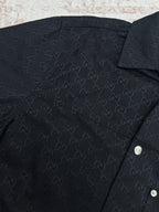 Dark navy Gucci monogram short-sleeve shirt fabric close-up