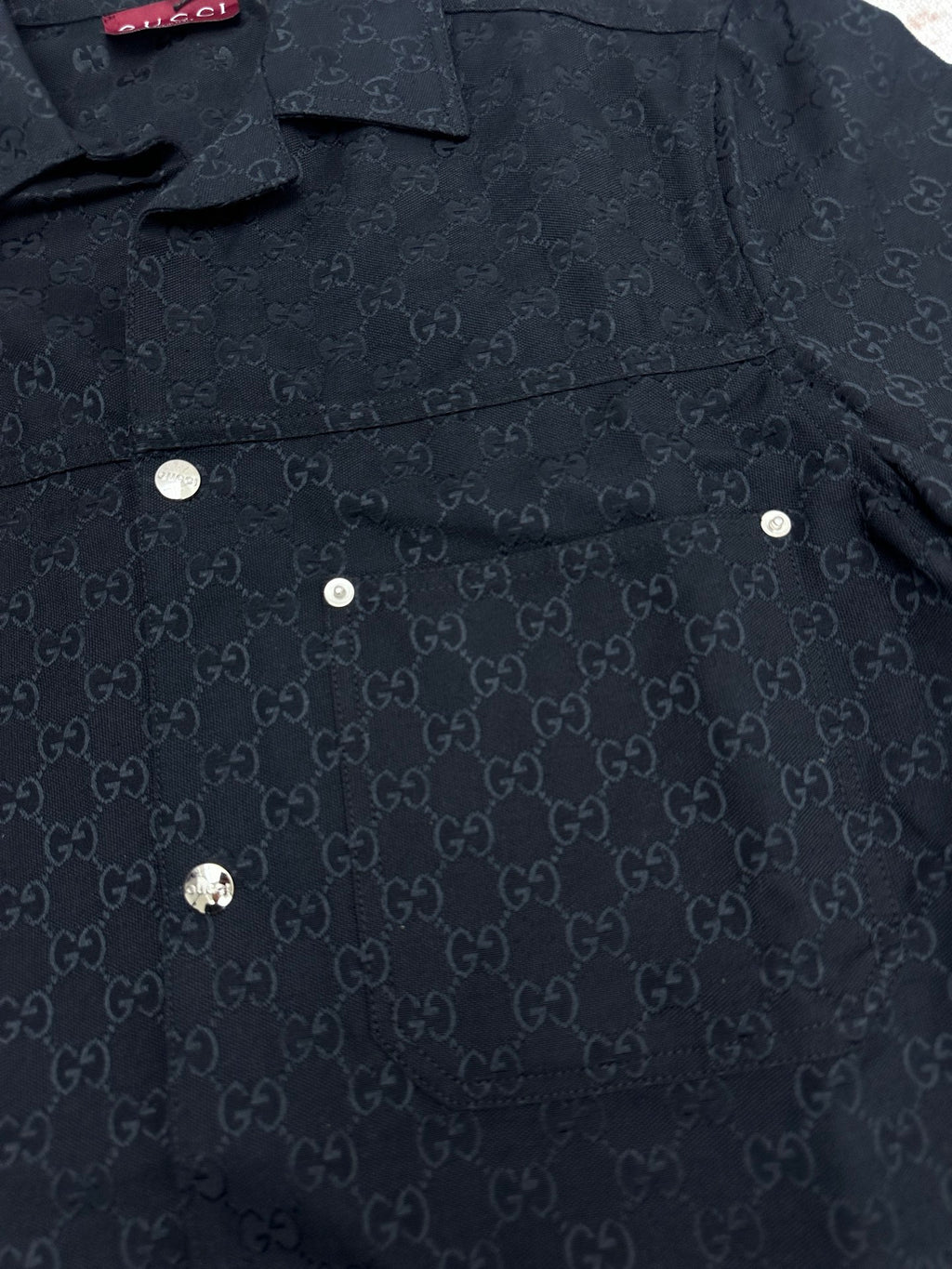 Dark navy Gucci-pattern short-sleeve shirt front, pocket and buttons
