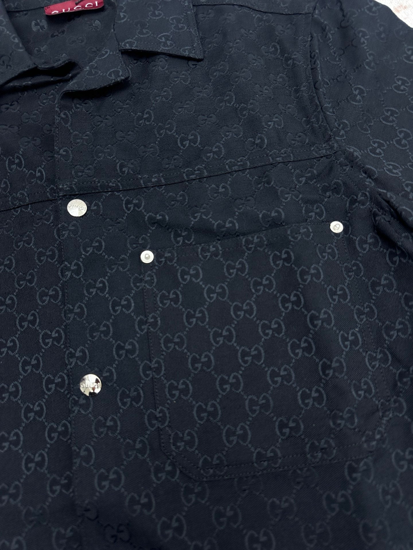 Dark navy Gucci-pattern short-sleeve shirt front, pocket and buttons