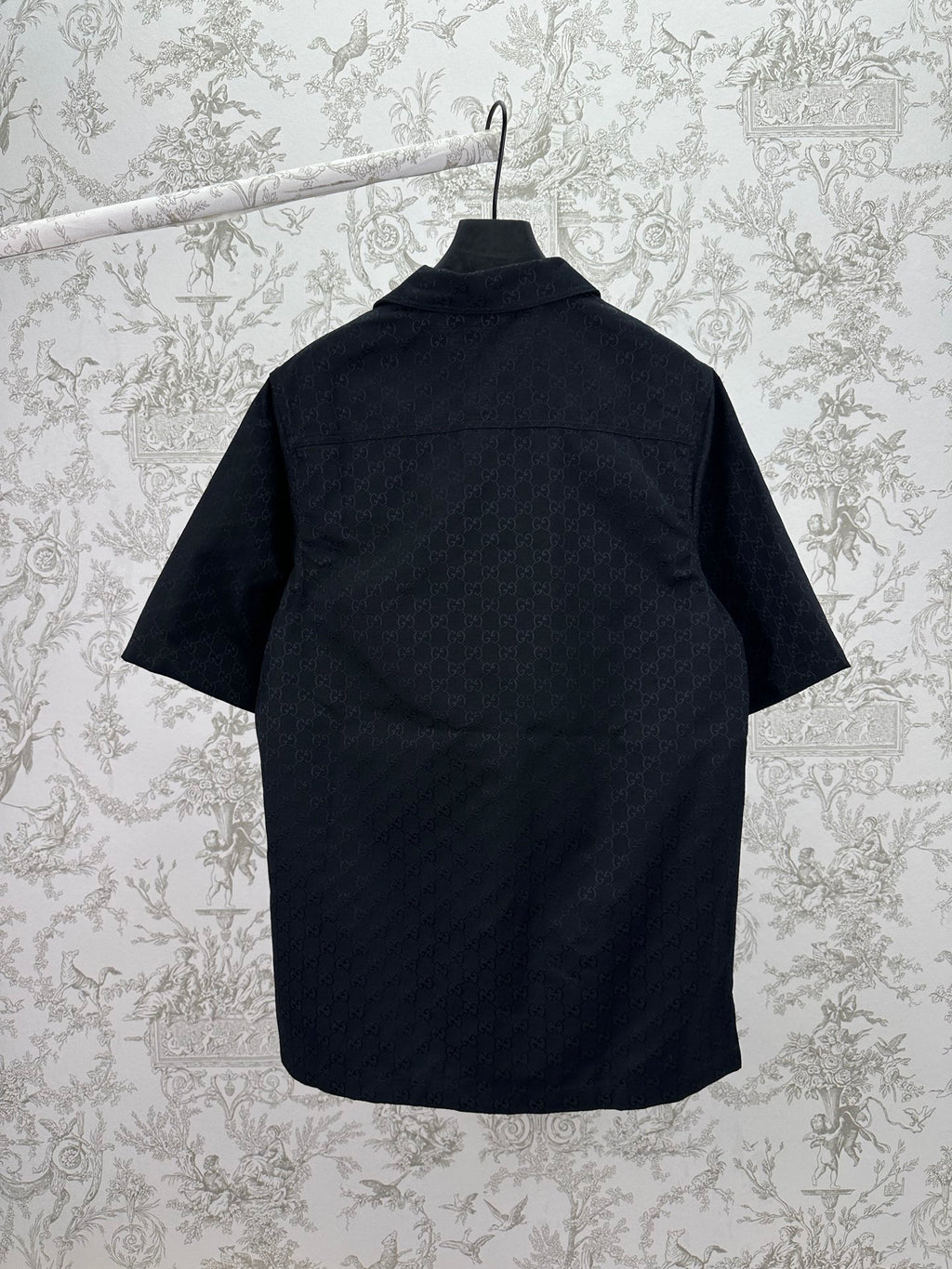 Dark navy short-sleeve shirt, back view with yoke seam