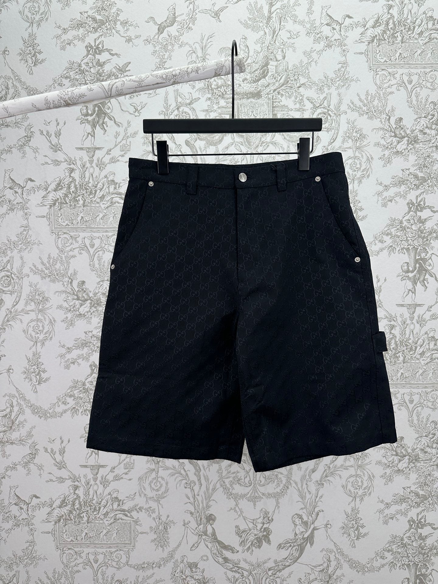Gucci shorts in dark navy with allover GG-style monogram pattern, front button closure
