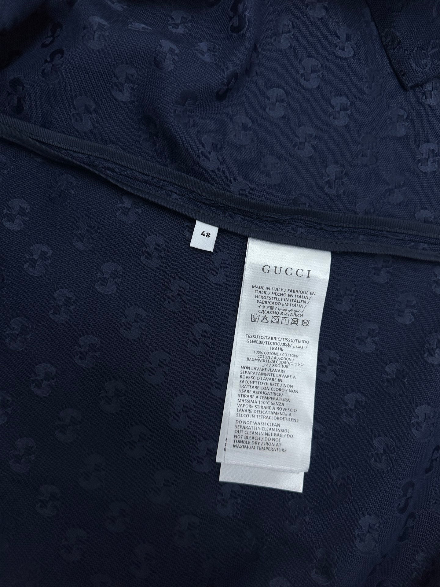 Dark navy short-sleeve shirt with interior care label and GG monogram print