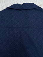 Dark navy short-sleeve button-up shirt back view with allover GG pattern