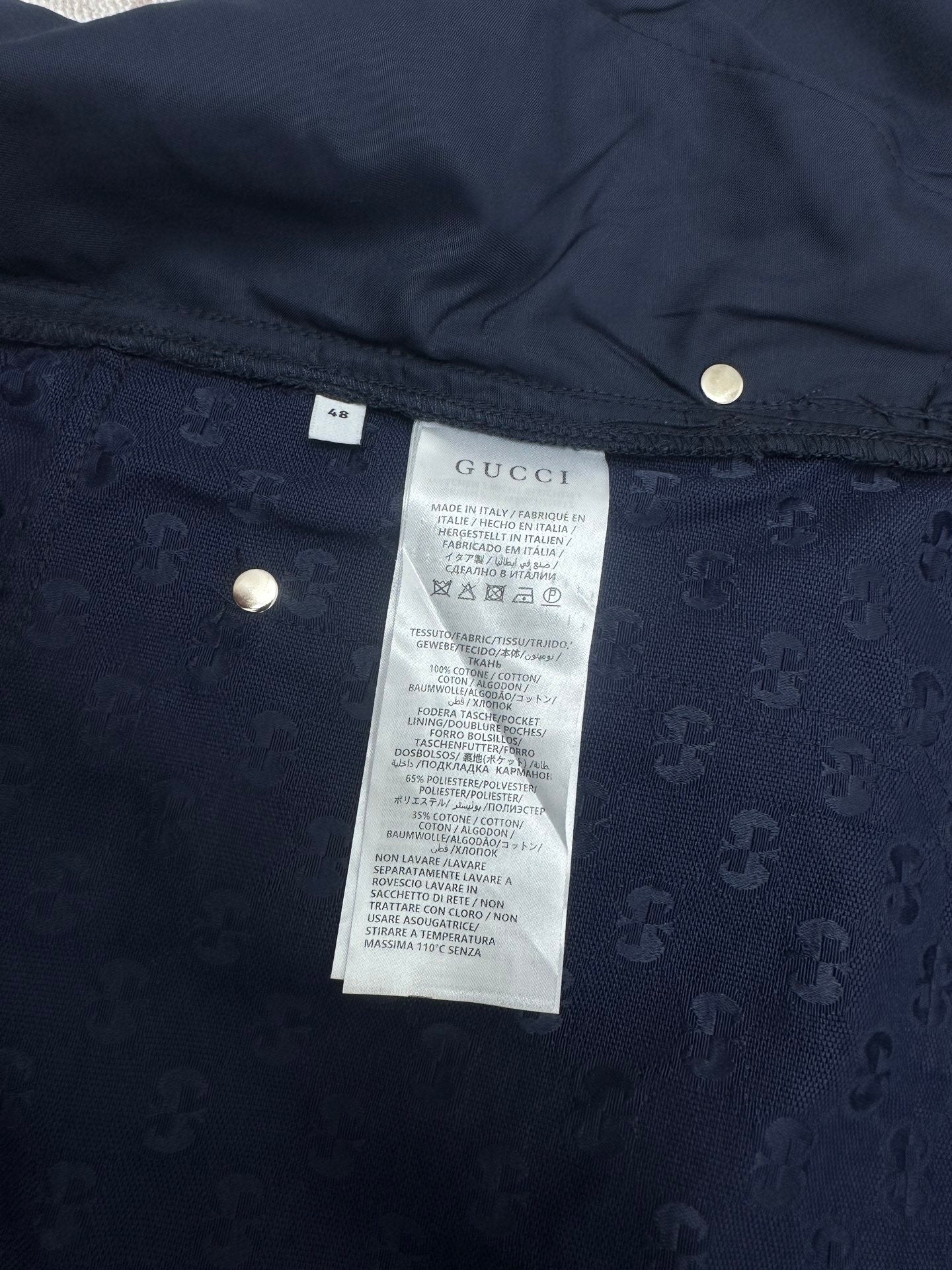 Gucci shorts in dark navy with interior care label and waistband button