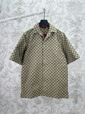Gucci short-sleeve shirt with GG pattern, button-front and pointed collar