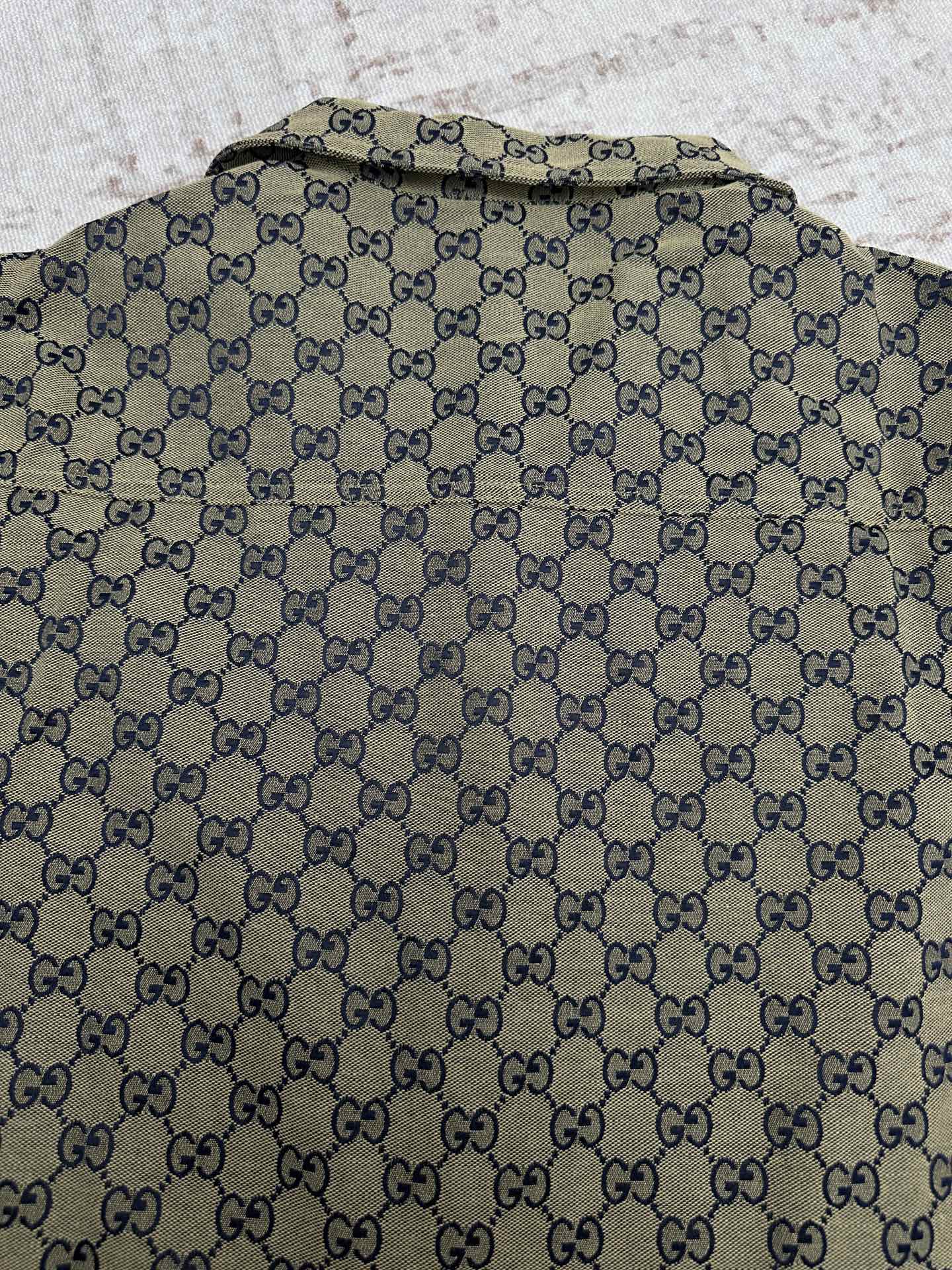 Gucci short-sleeve shirt back close-up with allover GG pattern