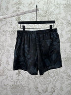 Dark floral shorts front view with elastic waistband