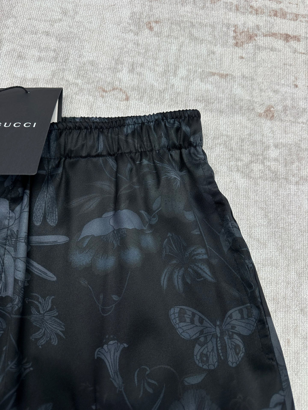 Dark floral shorts back view with elastic waistband