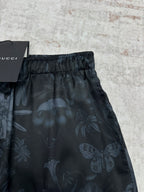 Dark floral shorts back view with elastic waistband