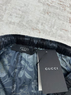 Gucci dark floral shorts interior with waistband label and tag