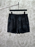 Gucci dark floral shorts with elastic waistband