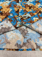 Short-sleeve shirt fabric draped, blue and tan bear print pattern
