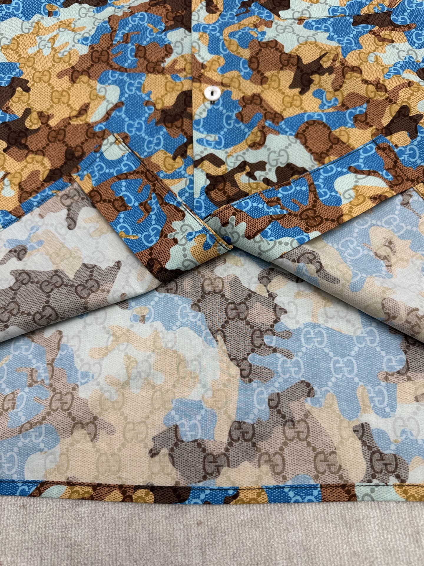 Short-sleeve shirt fabric draped, blue and tan bear print pattern