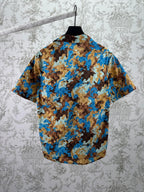 Short-sleeve button-up shirt, back view, blue and tan bear print