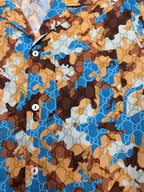 Short-sleeve button-up shirt with blue and brown bear print and button placket
