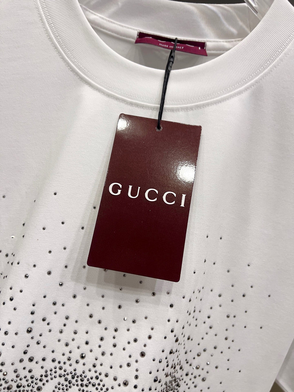 Gucci white T-shirt with small rhinestone speckle pattern and hanging Gucci tag