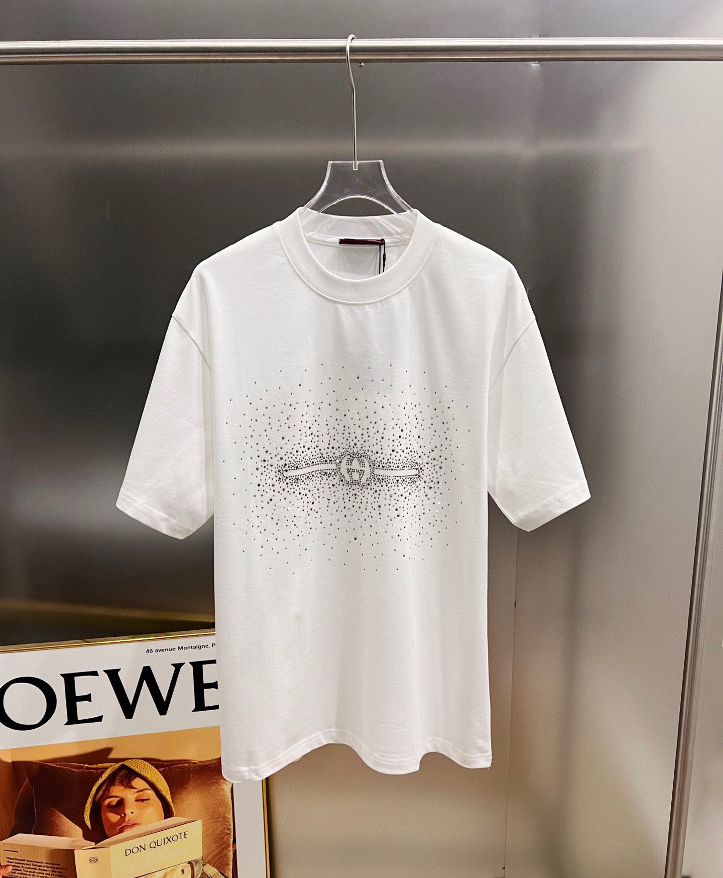 Gucci short-sleeve T-shirt in white with rhinestone logo and bow detail at center