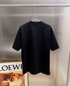 Black Gucci short-sleeve T-shirt, back view on hanger