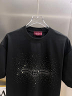 Black Gucci short-sleeve T-shirt on hanger with rhinestone chest emblem