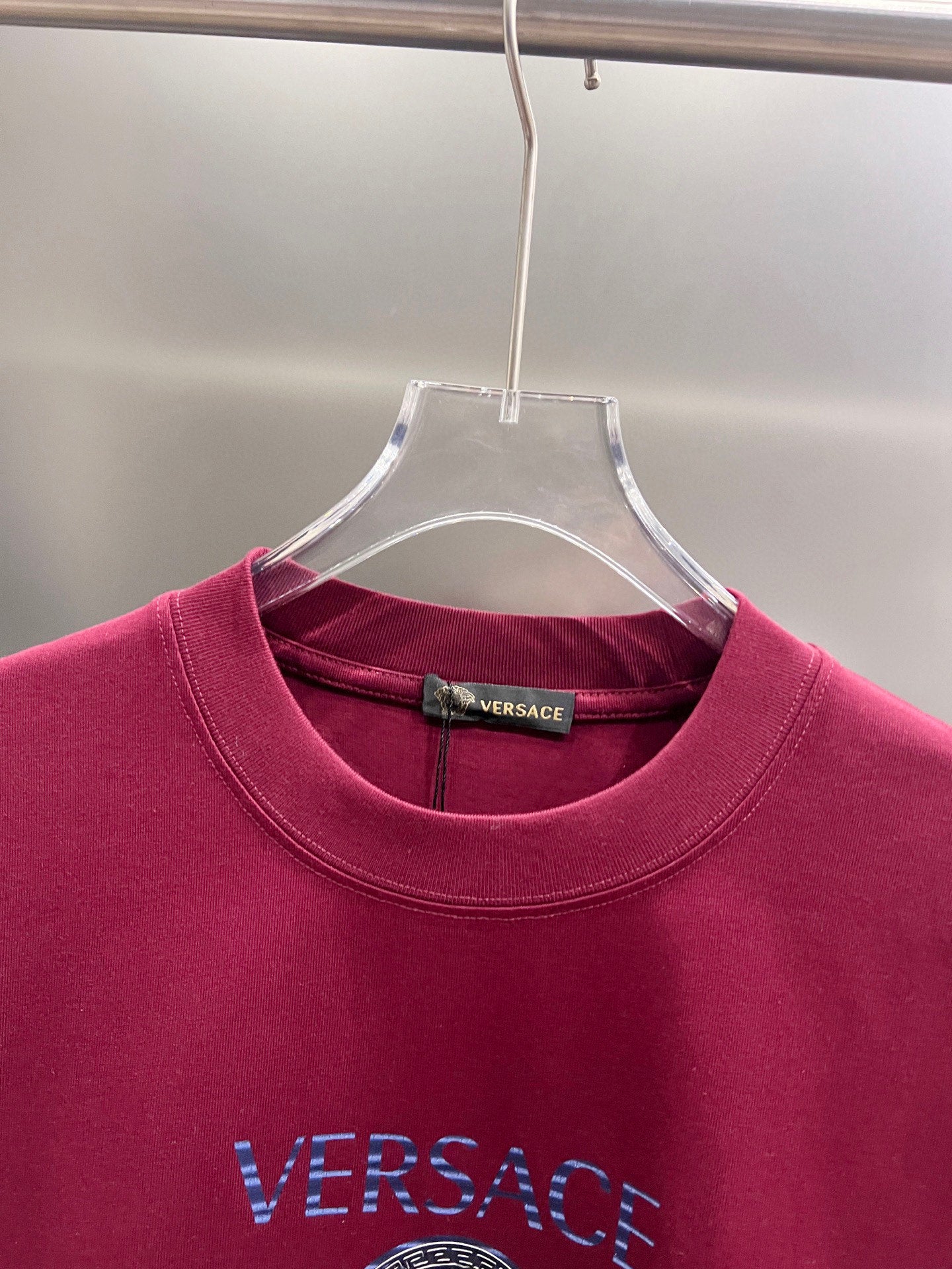 Magenta Versace T-shirt collar and front logo detail