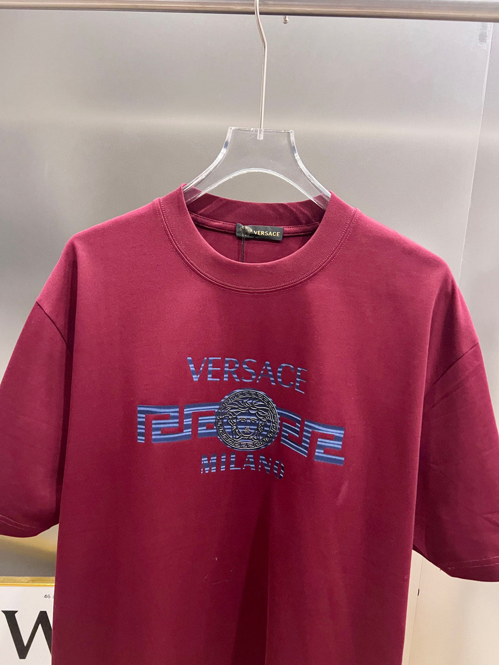 Magenta Versace T-shirt front view with logo print and crew neck