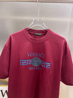 Magenta Versace T-shirt front view with logo print and crew neck