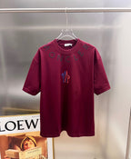 Moncler dark-red short-sleeve T-shirt with front graphic logo and lettering