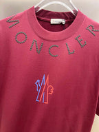 Moncler dark-red short-sleeve T-shirt front close-up with studded lettering