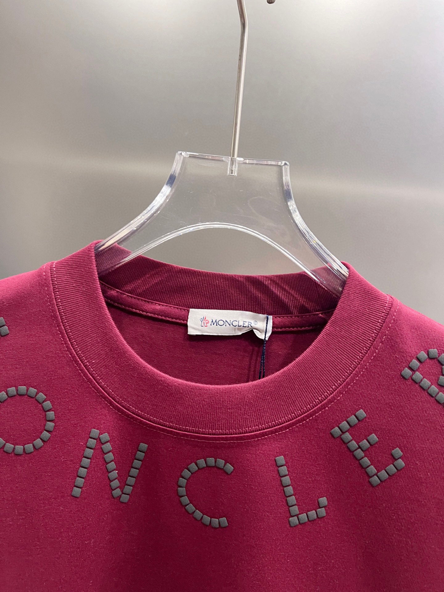 Moncler dark-red short-sleeve T-shirt neckline with logo patch and studs