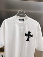 White graphic T-shirt front view with black cross design at the center chest