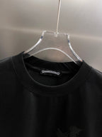 Black crewneck T-shirt with brand label at collar