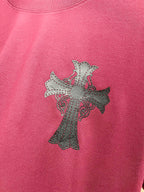 Burgundy T-shirt with light gray cross embroidery with small pink accents.