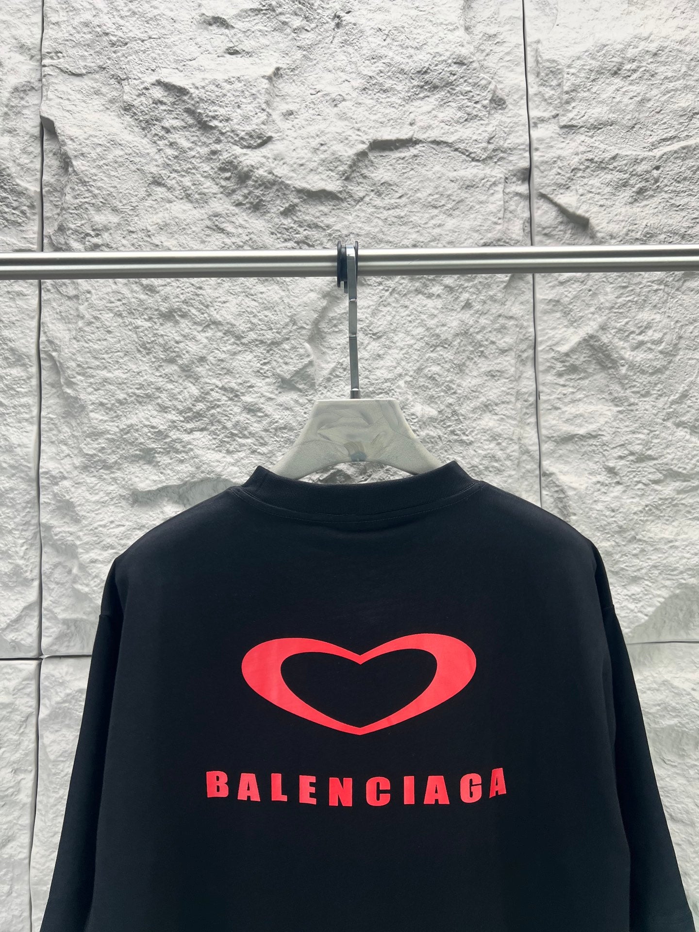 Balenciaga dark T-shirt back with large red heart logo and Balenciaga lettering