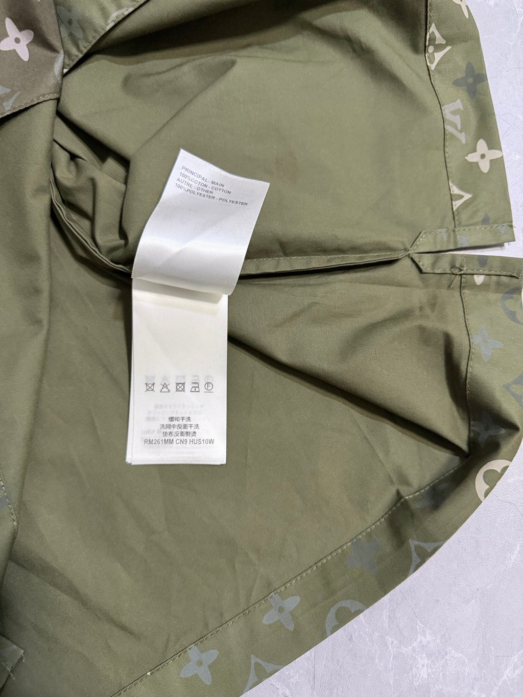 Louis Vuitton monogram short-sleeve shirt in olive green with interior label and stitching