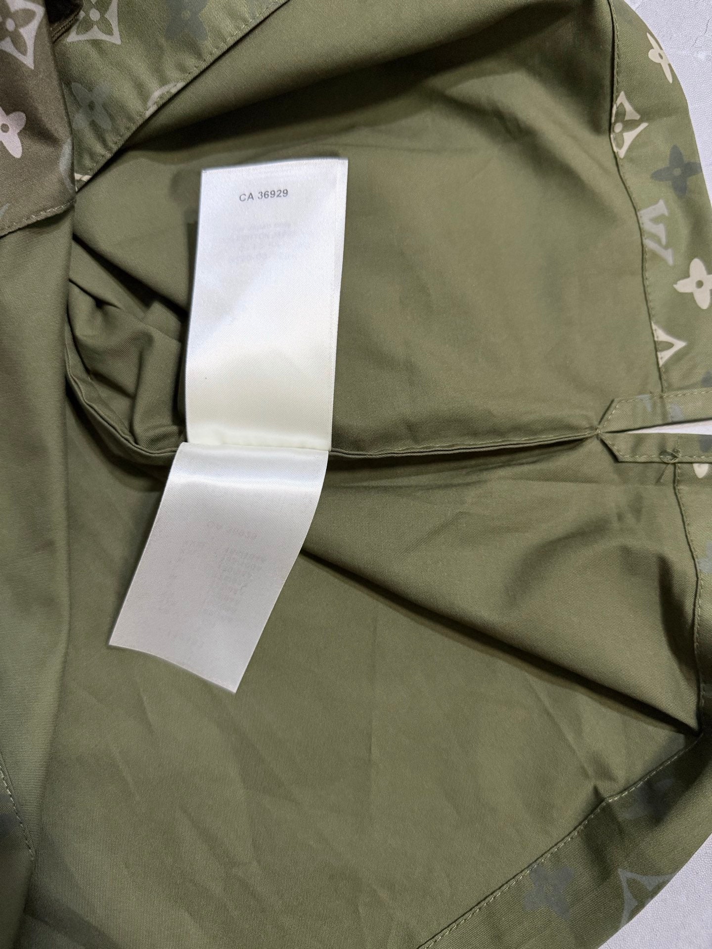 Louis Vuitton monogram short-sleeve shirt in olive green with interior label and side seam