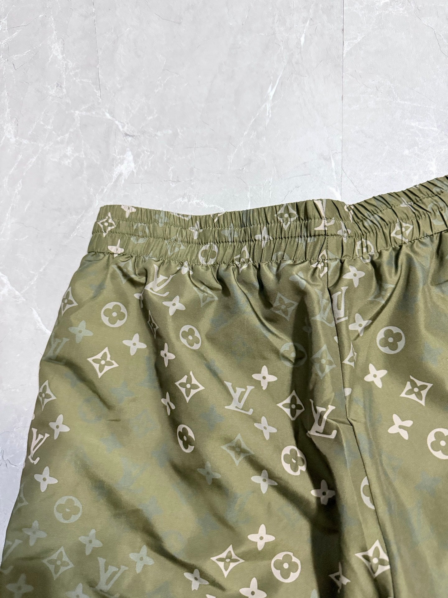 Louis Vuitton monogram shorts back view with gathered waist, olive green