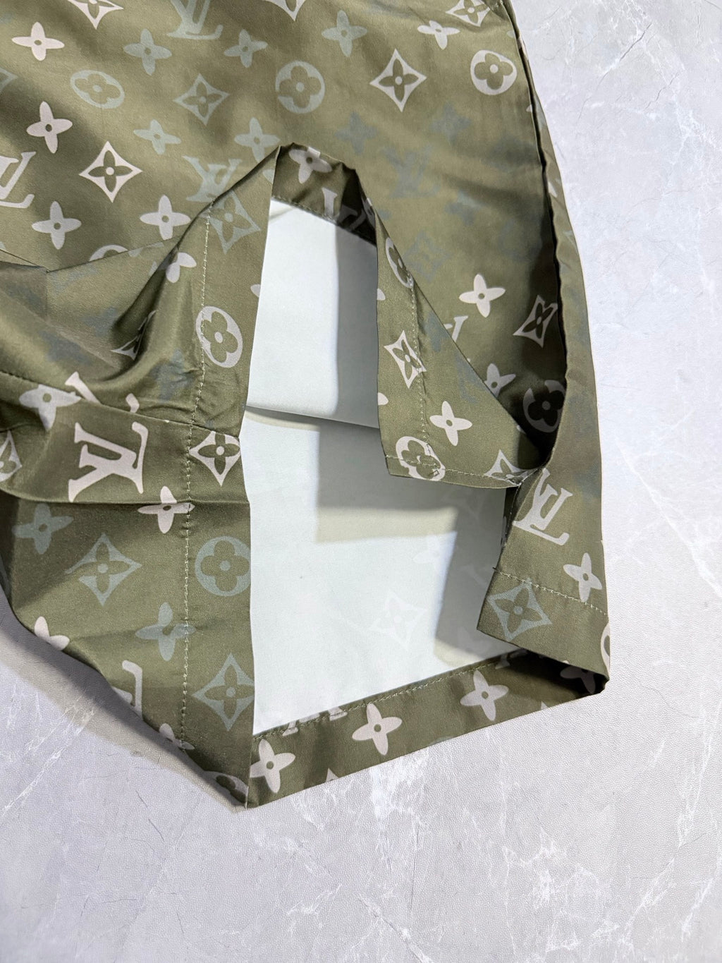 Louis Vuitton monogram shorts close-up, front lining and side seam detail