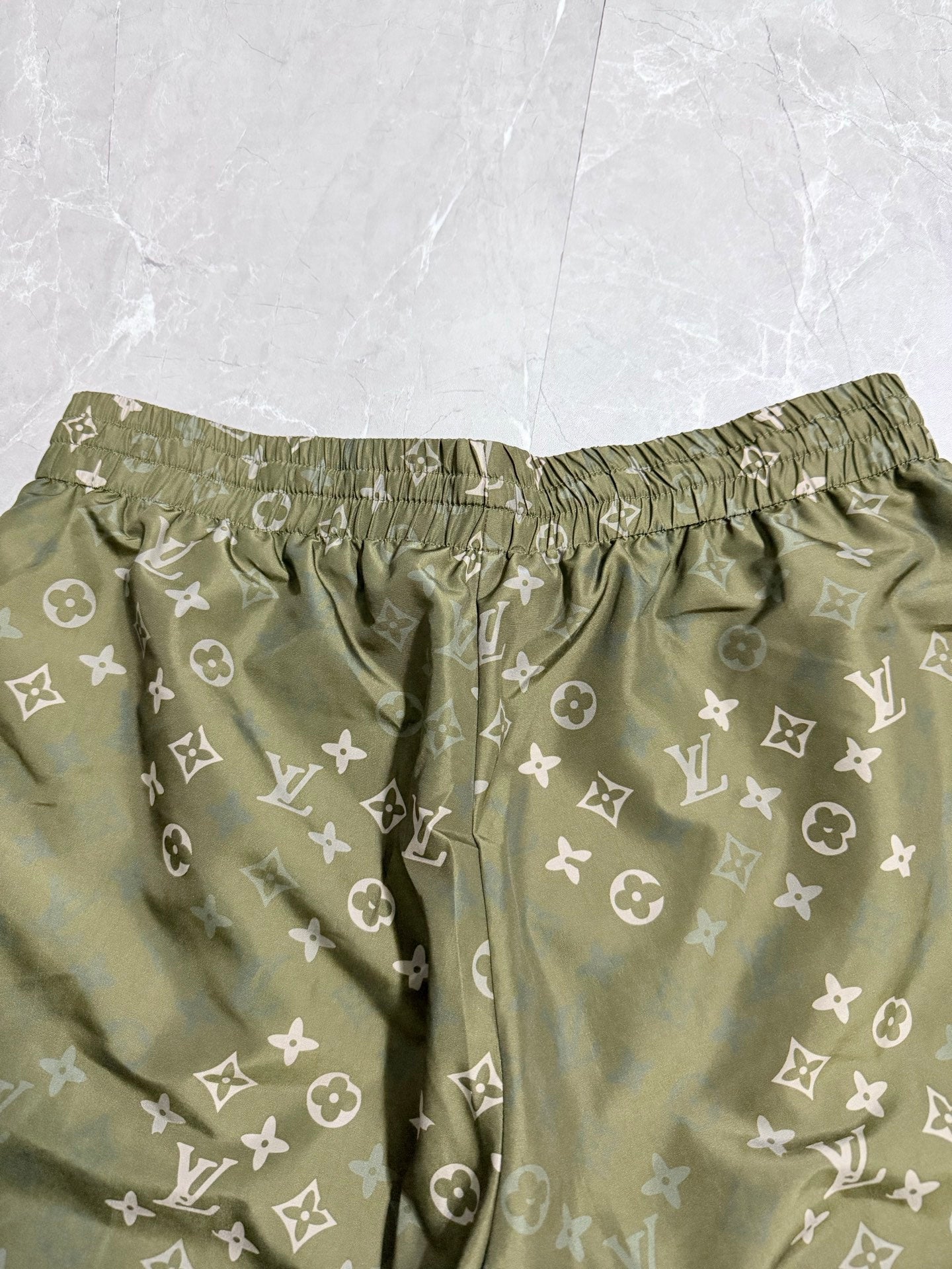 Louis Vuitton monogram shorts back view, elastic waistband, olive green