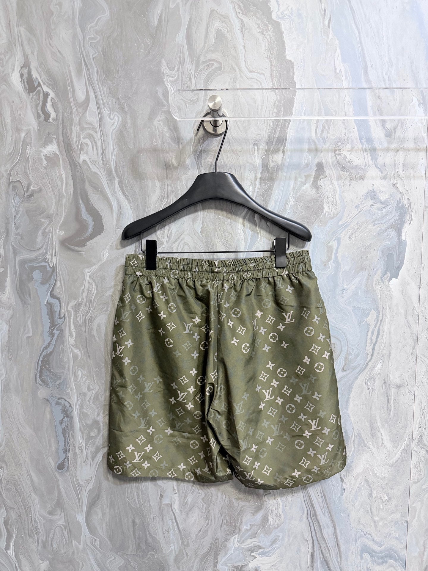 Louis Vuitton monogram shorts front view, elastic waist and drawstring, olive green