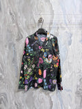 Gucci floral long-sleeve shirt on dark base with colorful flowers and butterflies