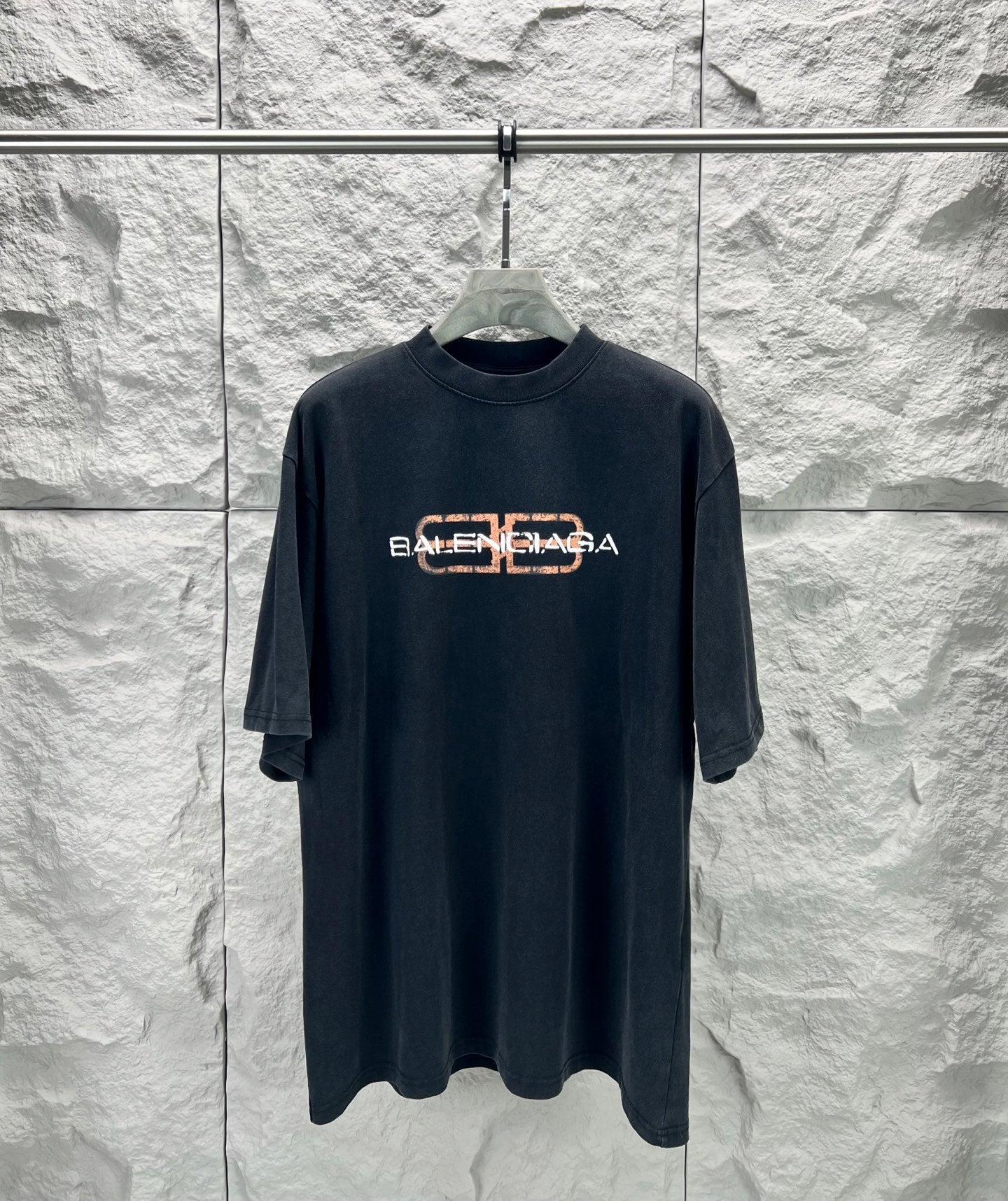 Dark navy Balenciaga short-sleeve T-shirt with orange logo on chest